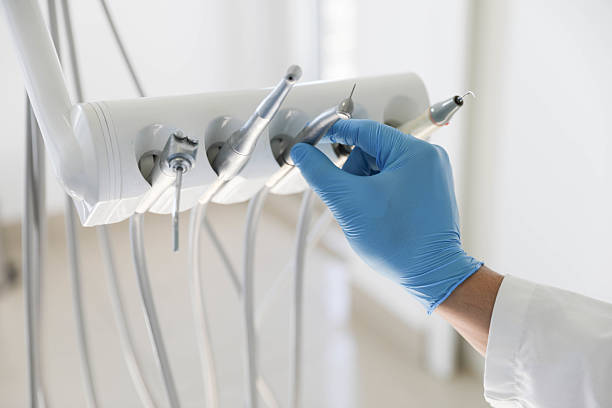 Professional Tooth Extraction technician working in Columbus County County, NC